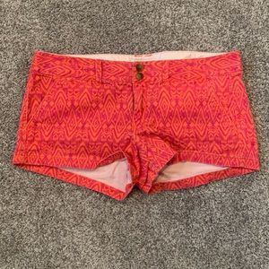 Pink and Orange American Eagle patterned stretch shorts